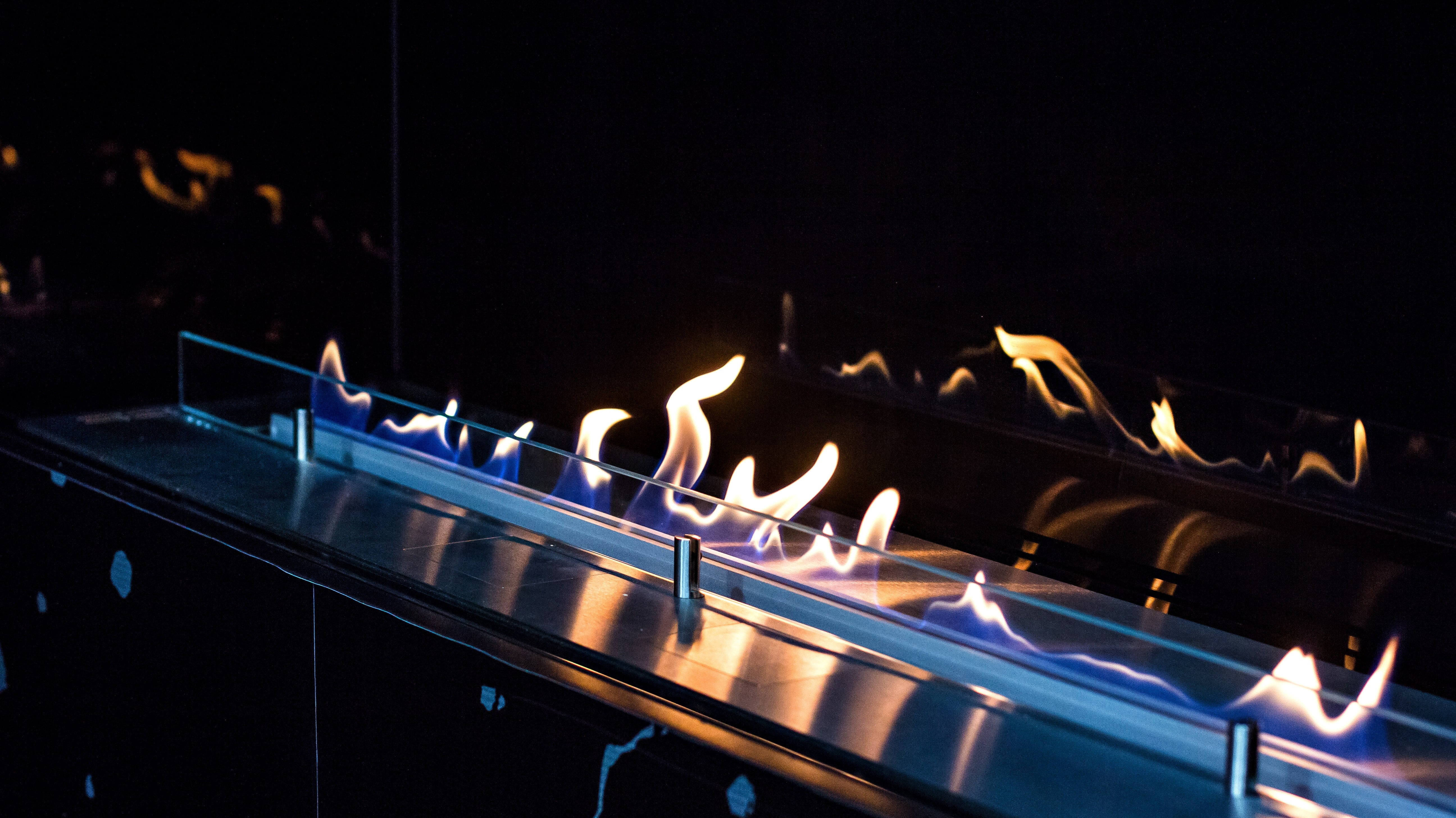 Ethanol burner’s orange dancing flames.