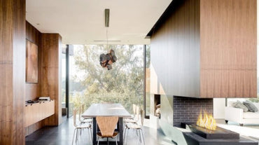 Contemporary wall mounted fireplace in kitchen