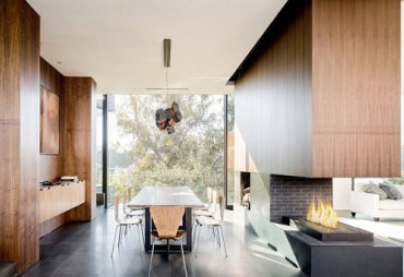 Contemporary wall mounted fireplace in kitchen