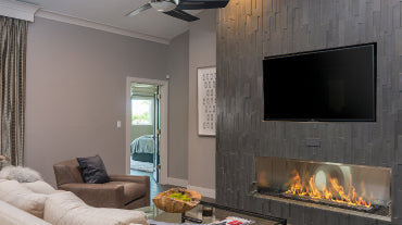 Bioethanol fireplace mounted underneath television