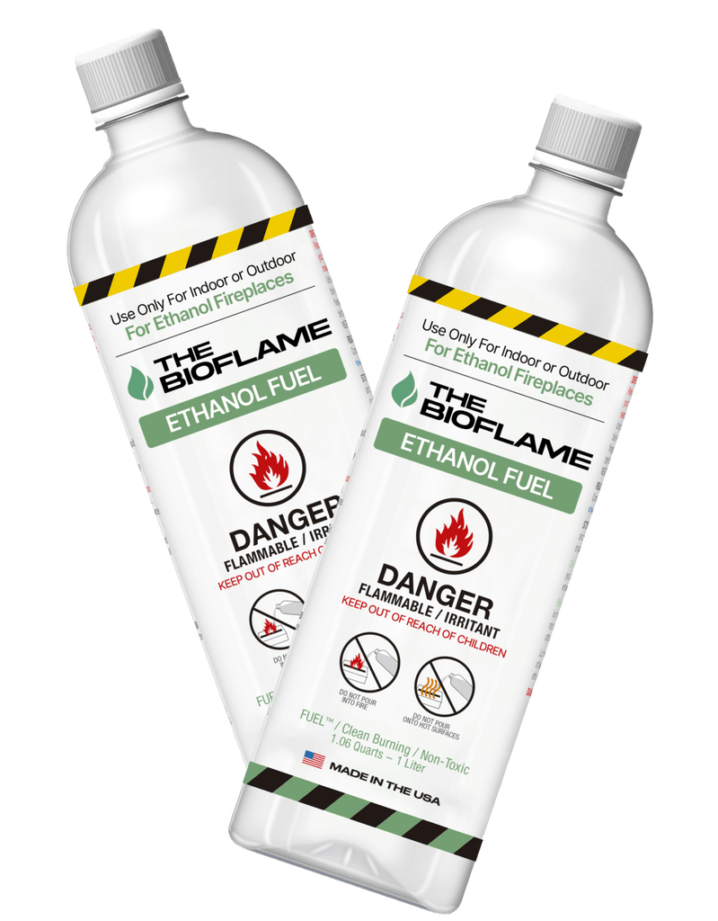 Two white bottles of Bio Flame ethanol fuel. The label on both bottles reads, “Use only for indoor or outdoor for ethanol fireplaces. The BioFlame ethanol fuel. Danger. Flammable Keep out of reach of children. Fuel/Clean burning/ Non-Toxic, 1.06 Quarts - 1 Liter. Made in the USA”